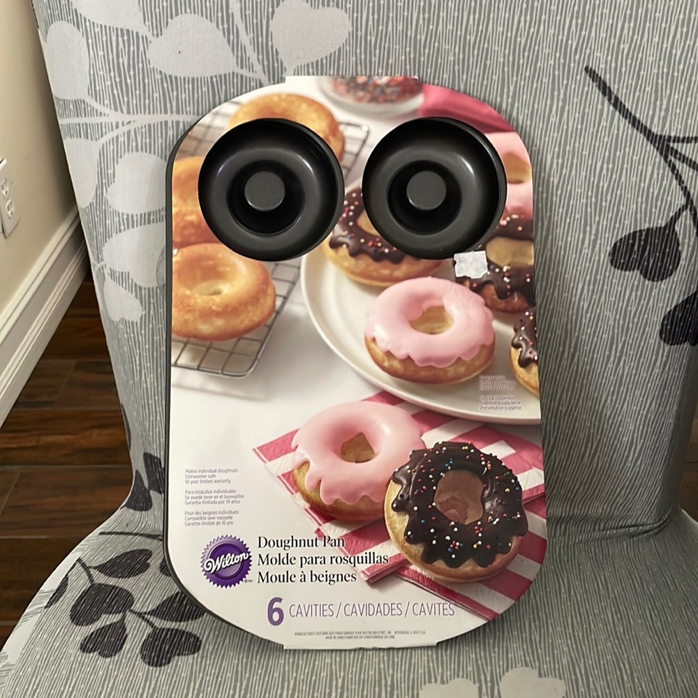 New in package Wilton doughnut pan 6 cavities 12 x 8 inches